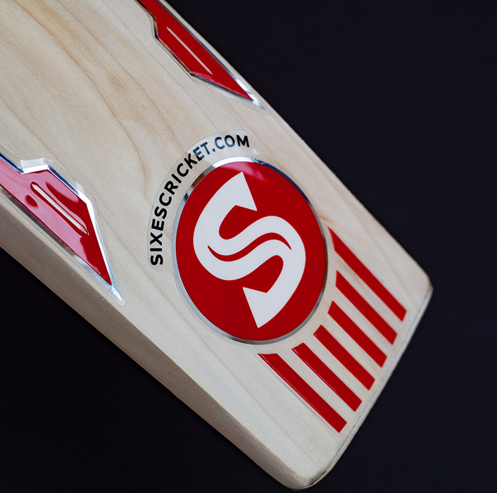 Sixes Social Cricket — Toe Detail — Roundel Badge with Six Stripes